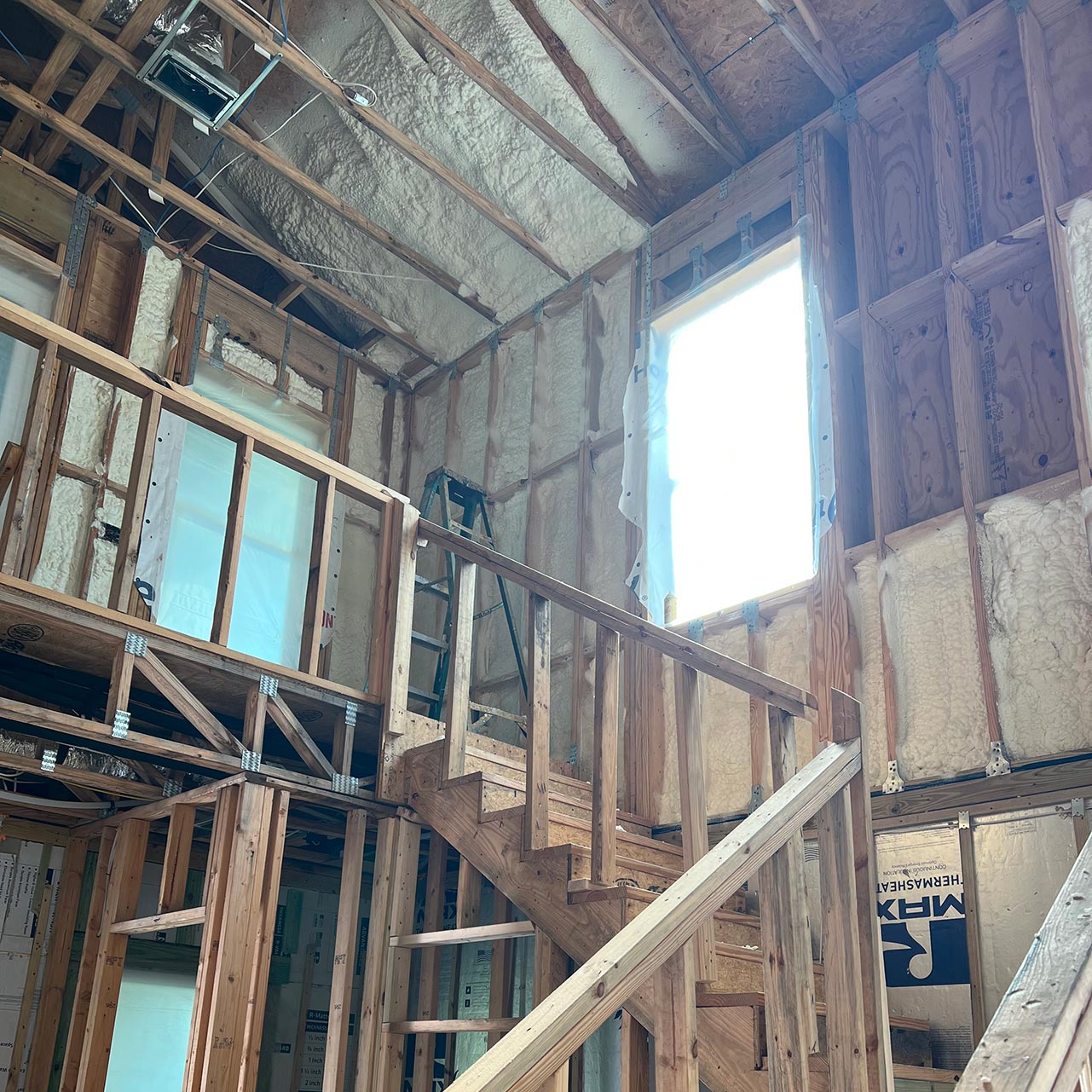 Residential ceiling foam insulation in new home